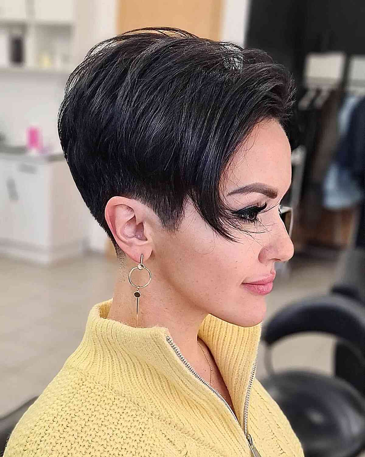 Low-Maintenance Jet Black Pixie Cut with Shaved Sides