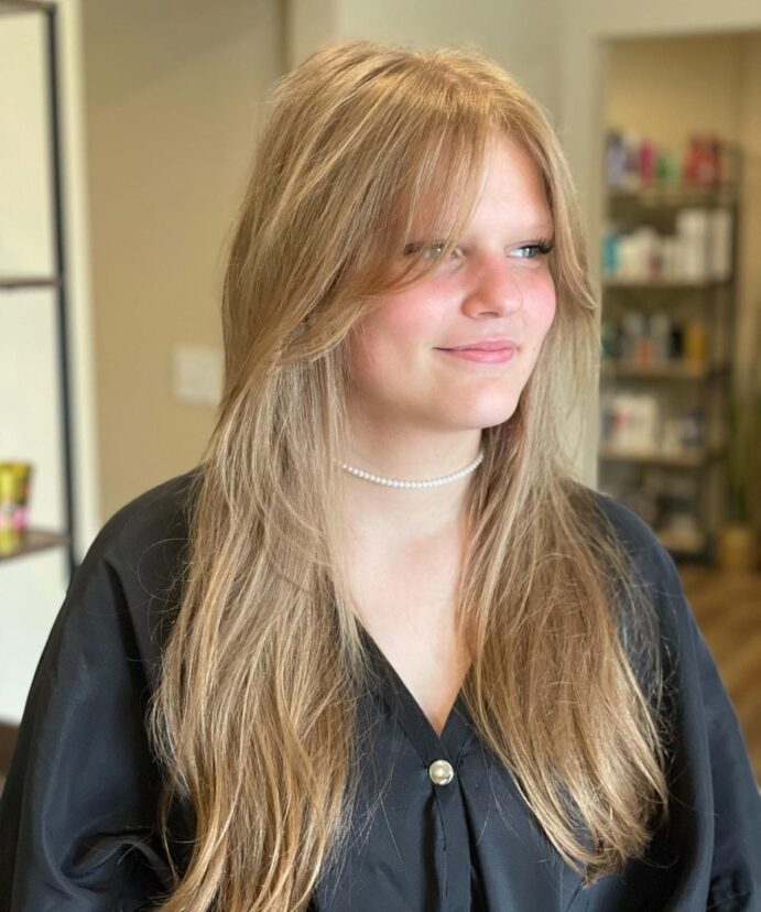 30 Best Ways to Wear Curtain Bangs for Straight Hair, According to Stylists