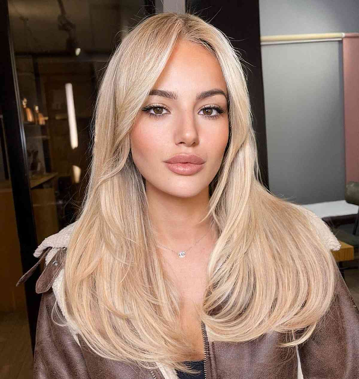 Low-Maintenance Long Middle-Parted Blonde Balayage Hair