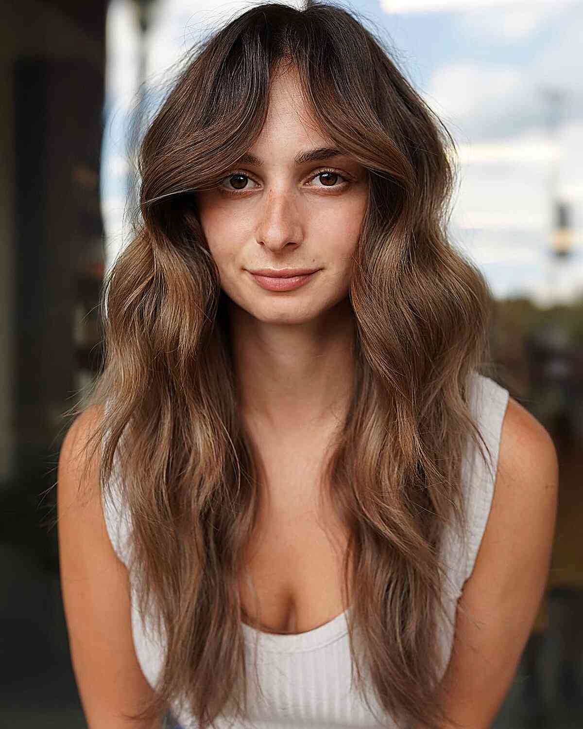 Low-Maintenance Long Thick Hair with curtain bangs
