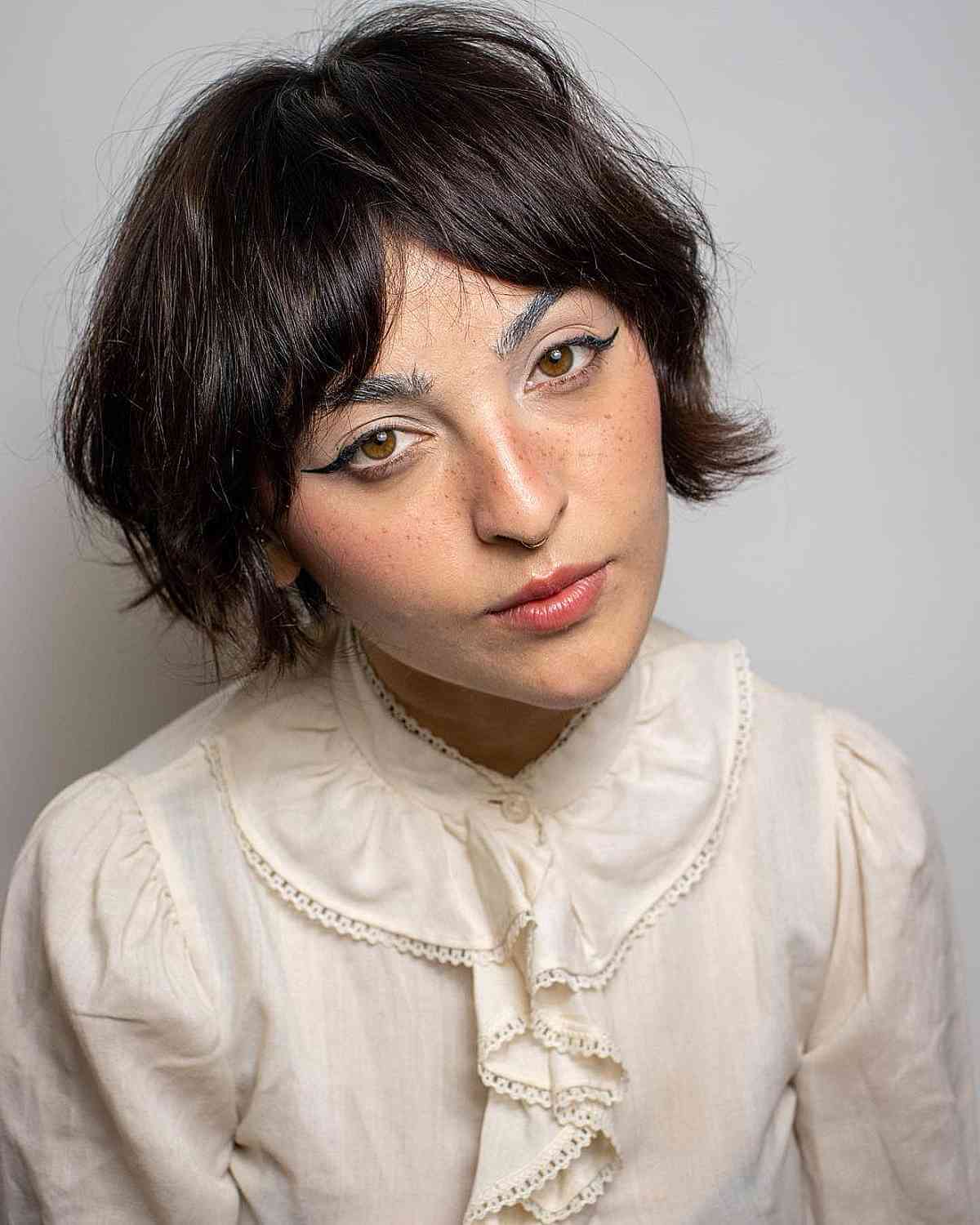 Low-Maintenance Messy Bob with Curtain Bangs