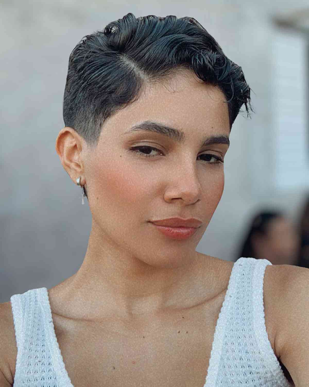 Low-Maintenance Messy Pixie Cut with a Hard Side Part for Women