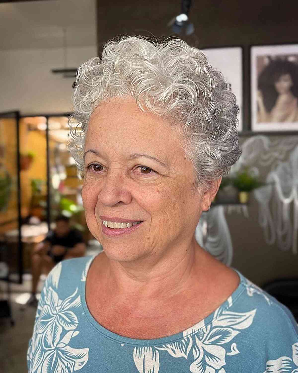 Low-Maintenance Pixie Cut Curly Hair on Senior Women Over 60 and Round-Shaped Faces