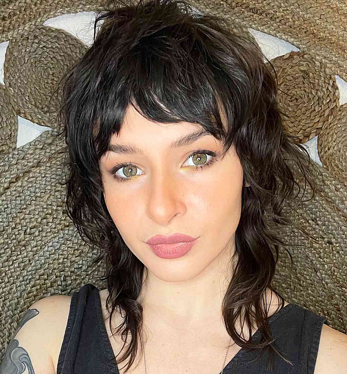 Low-Maintenance Shaggy Wolf Cut with Choppy Fringe for women with wispy hair