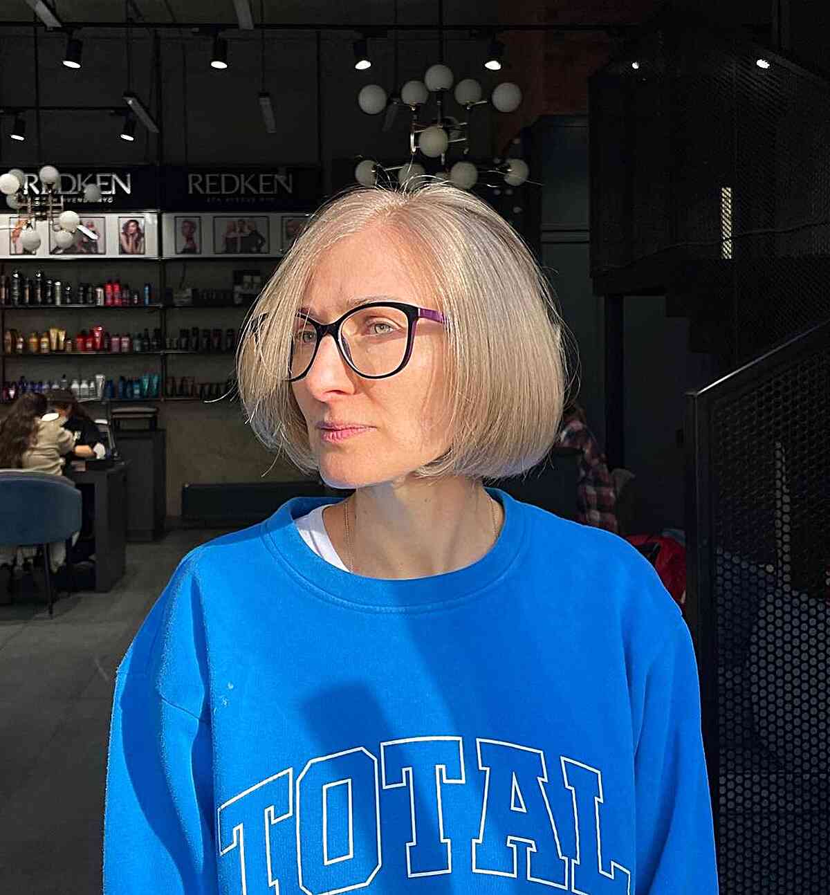 Low-Maintenance Short Round Bubble Bob for Older Women with Glasses