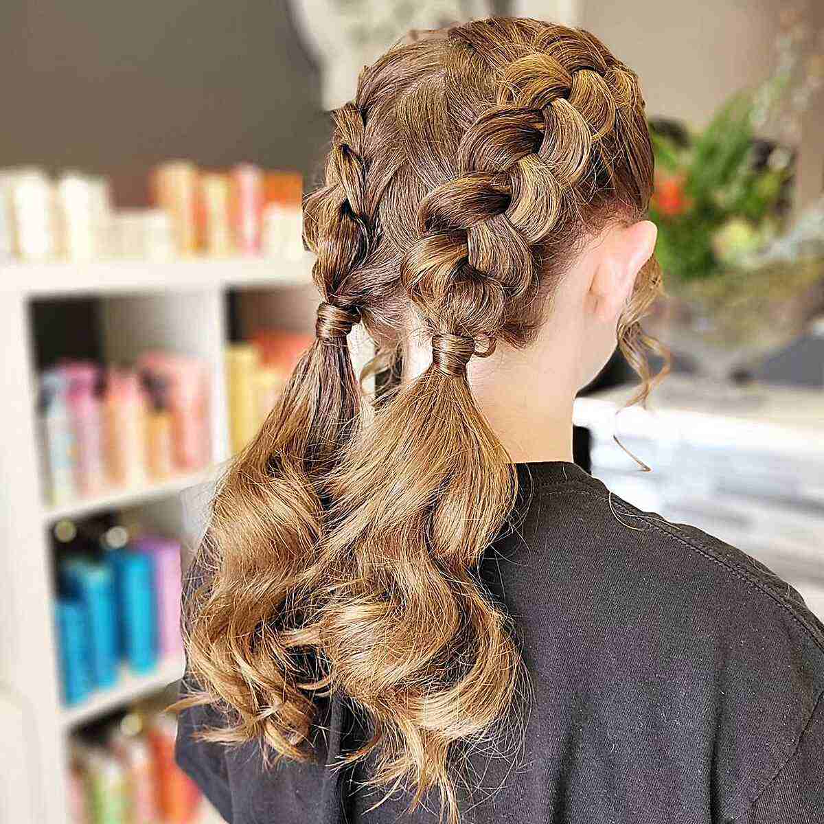 Mid-Length Low Pigtails with Dutch Braids for Young Cheerleading Dancers