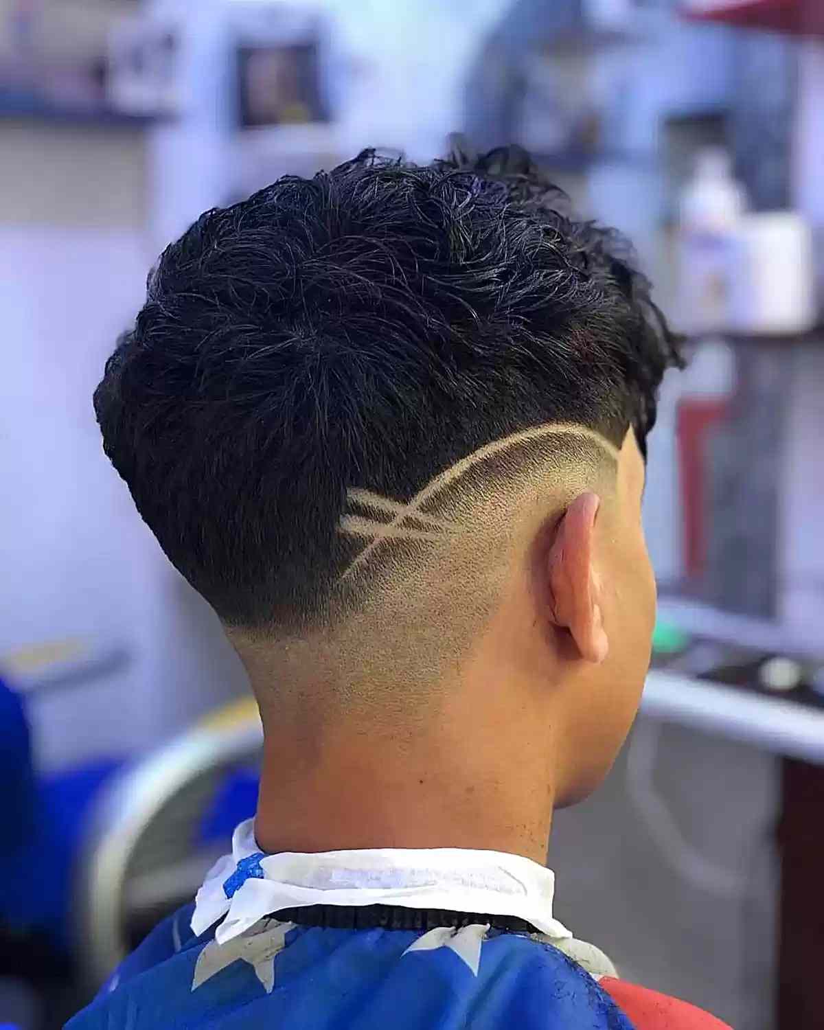 Low Skin Fade Cut with Curved Surgical Line and Shaved Lines