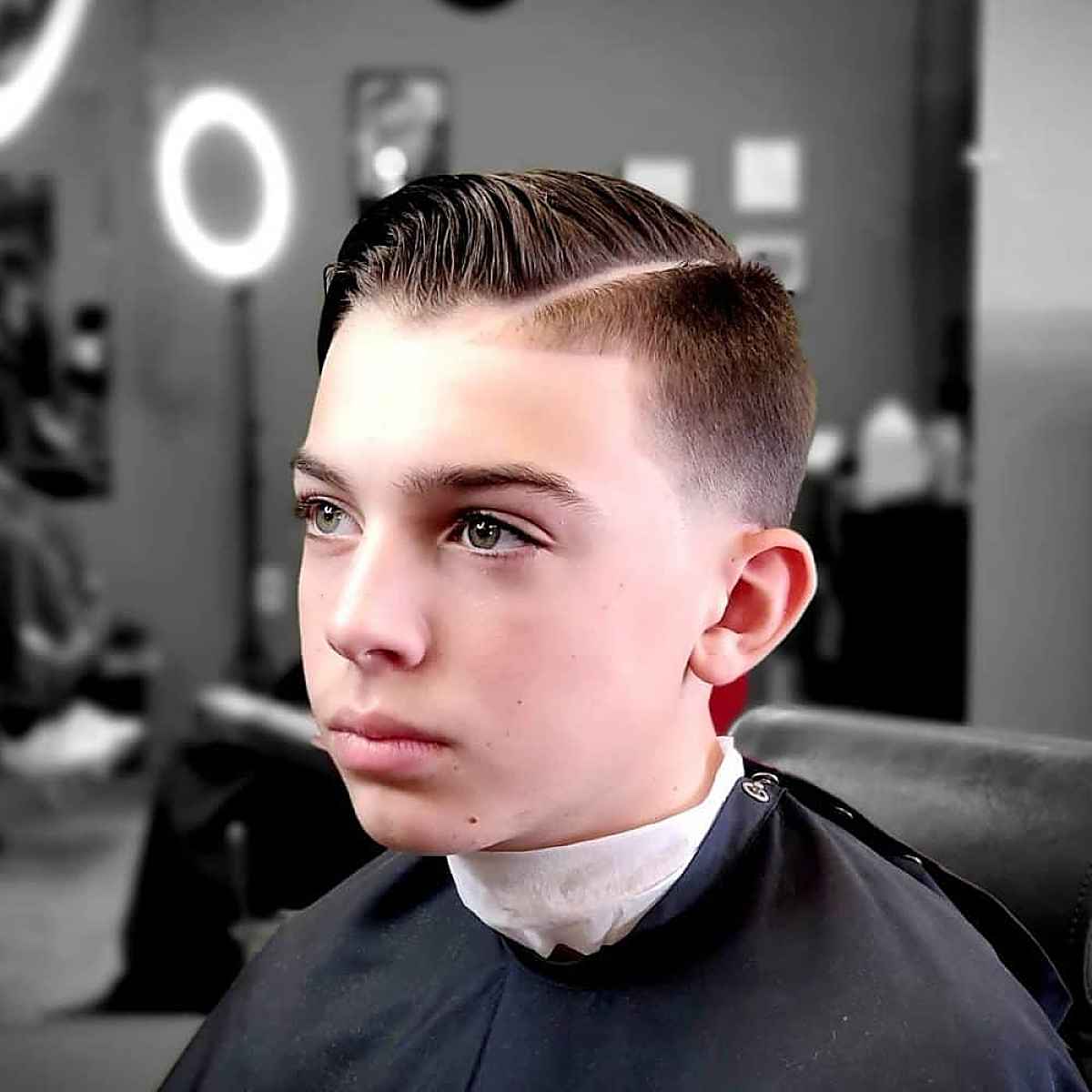 trendy low skin fade hairstyle for a little child