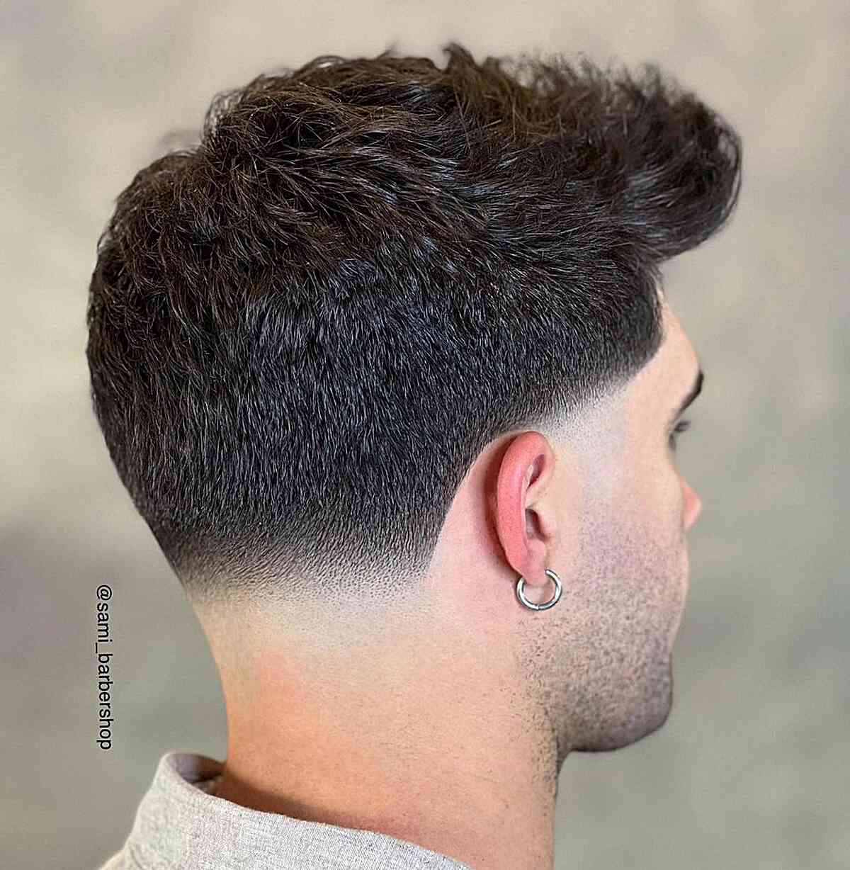 Low Skin Taper Fade for Thick Hair and for men with longer messy hair on top