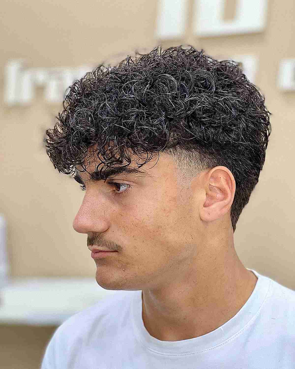 Low Taper Fade With Curly Hair: 25 Glamorous Styles To Look Exquisite!
