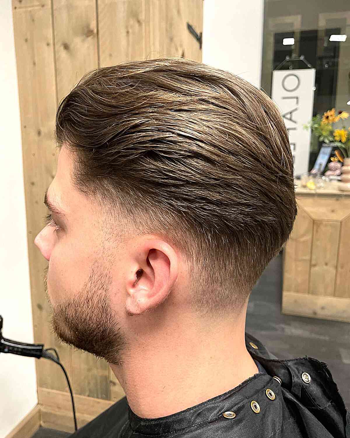 Low Tapered Fade and Slick Back Style on Brown Hair
