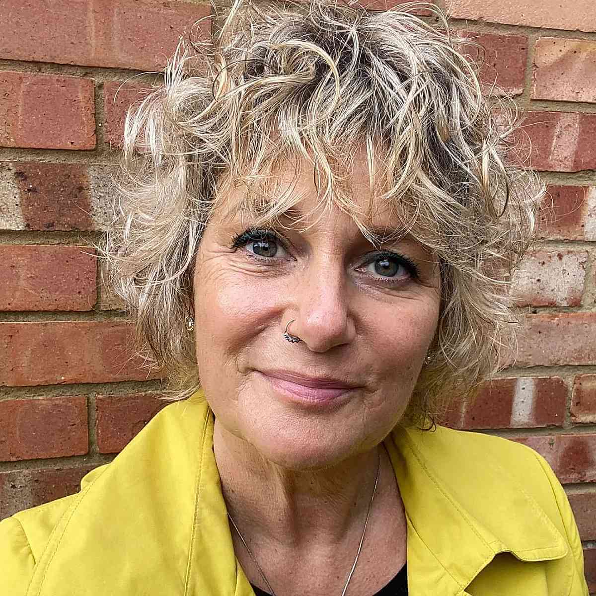 Mature Short Shaggy Curls with Bangs