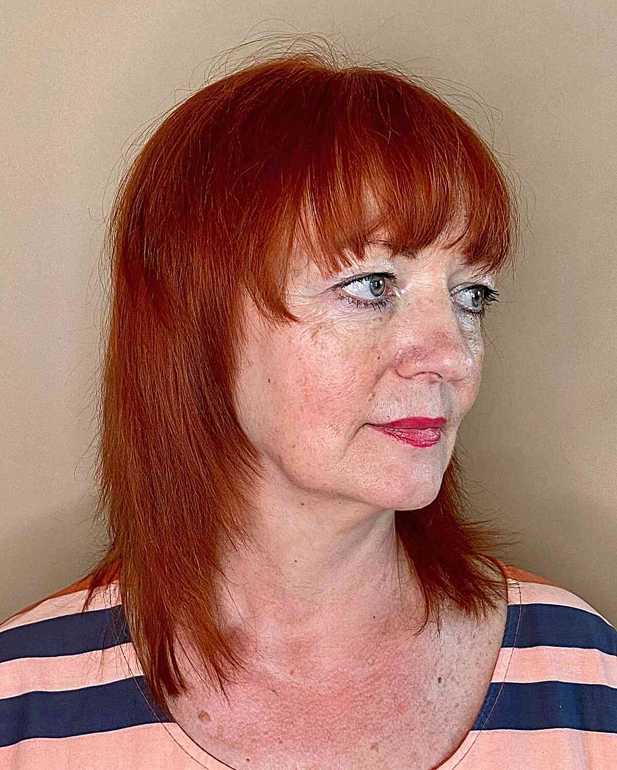 Medium Copper Shag with Visible Layers and Bangs for older women