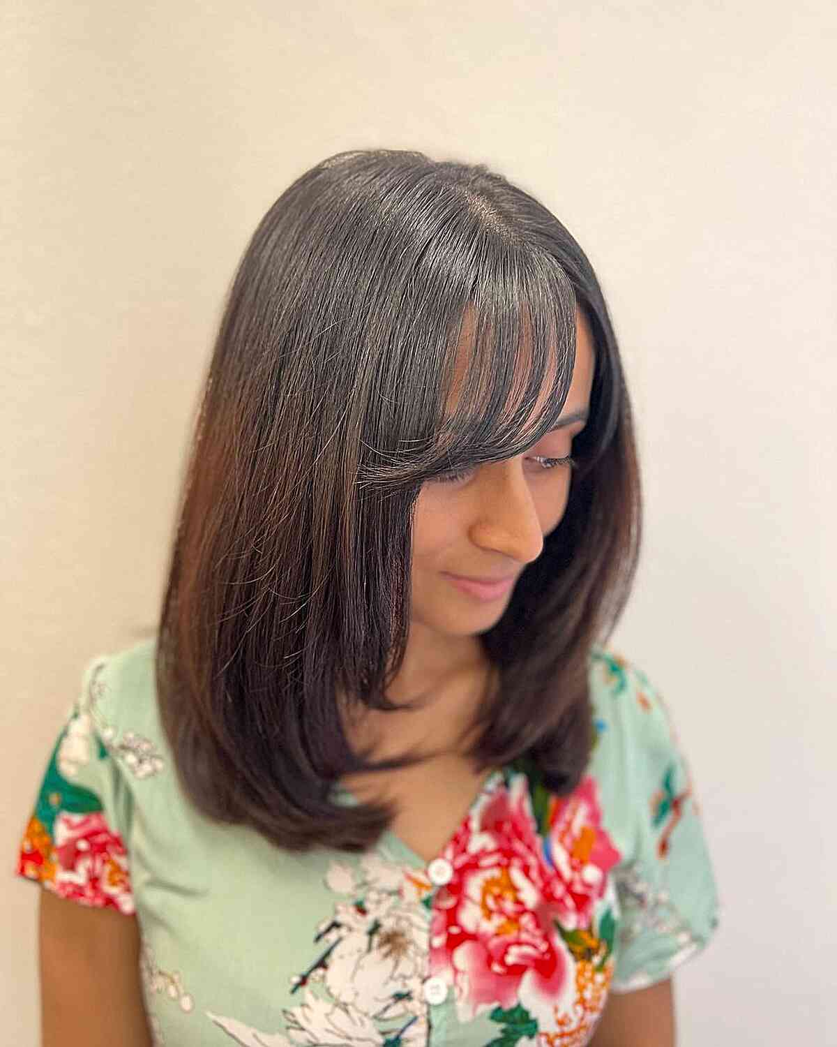 Medium Cut with Long See-Through Side Bangs and Subtle Layers