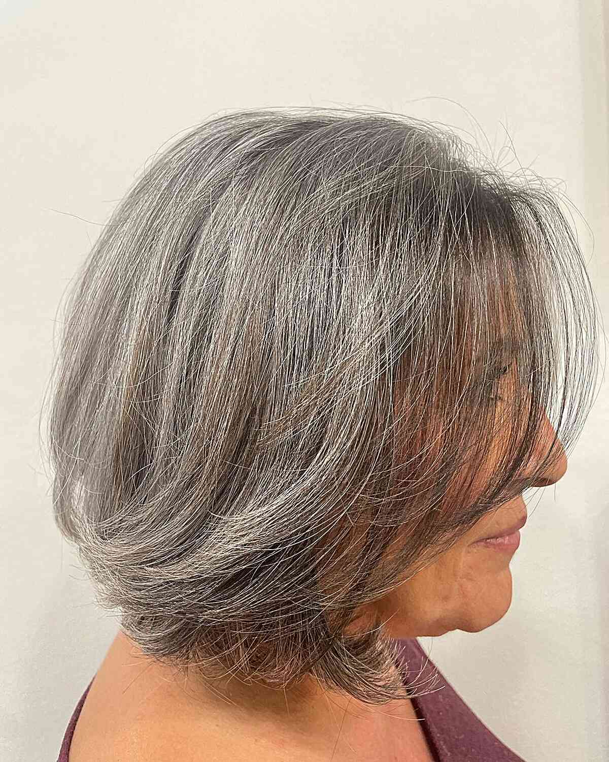 Medium Gray Butterfly Bob with Long Fringe on Older Ladies