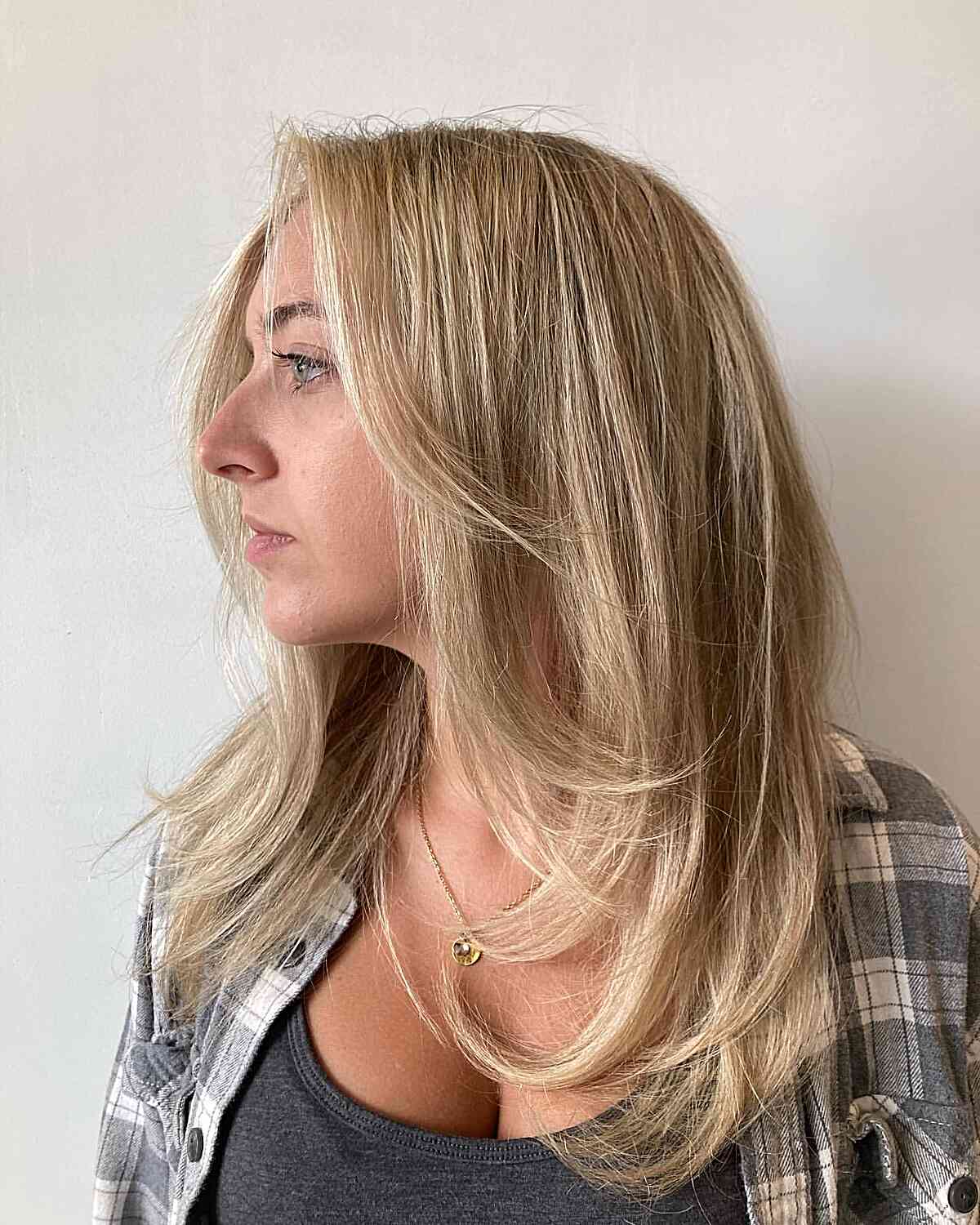 Medium Blonde Hair with Chunky Feathered Layers