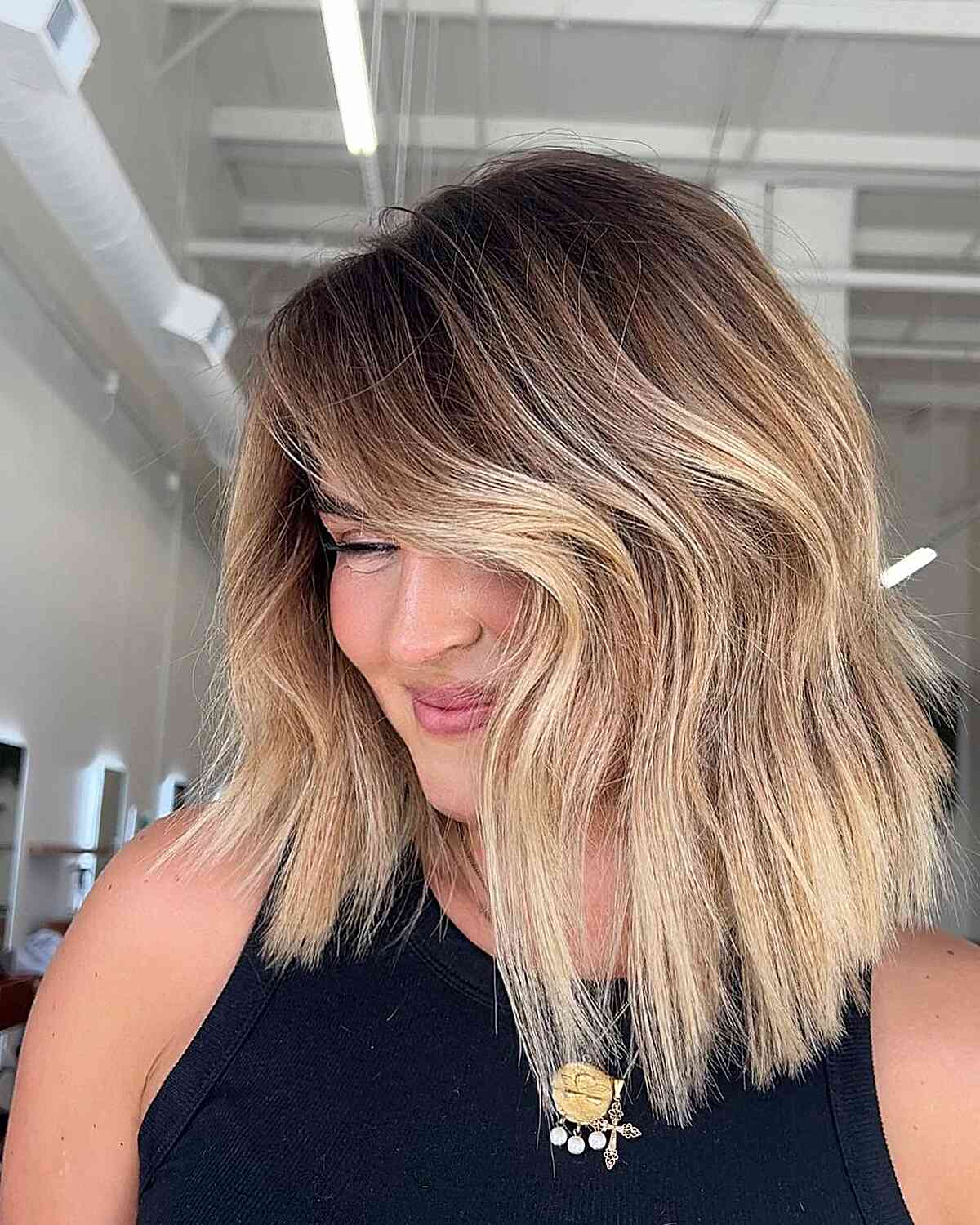 Medium Hair with Sun-Kissed Blonde Balayage and Root Smudge