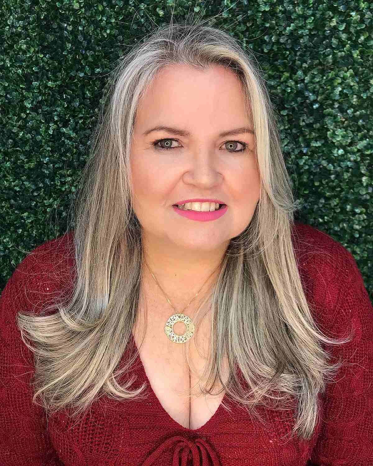 Medium-Length Blonde Balayage for Women Over 60 with Round Faces
