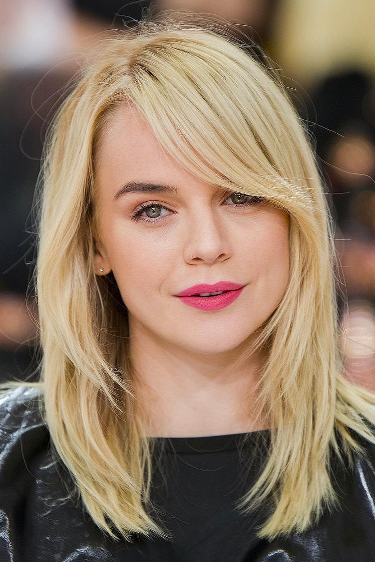 Medium-length haircut with side-swept bangs for fine to medium hair