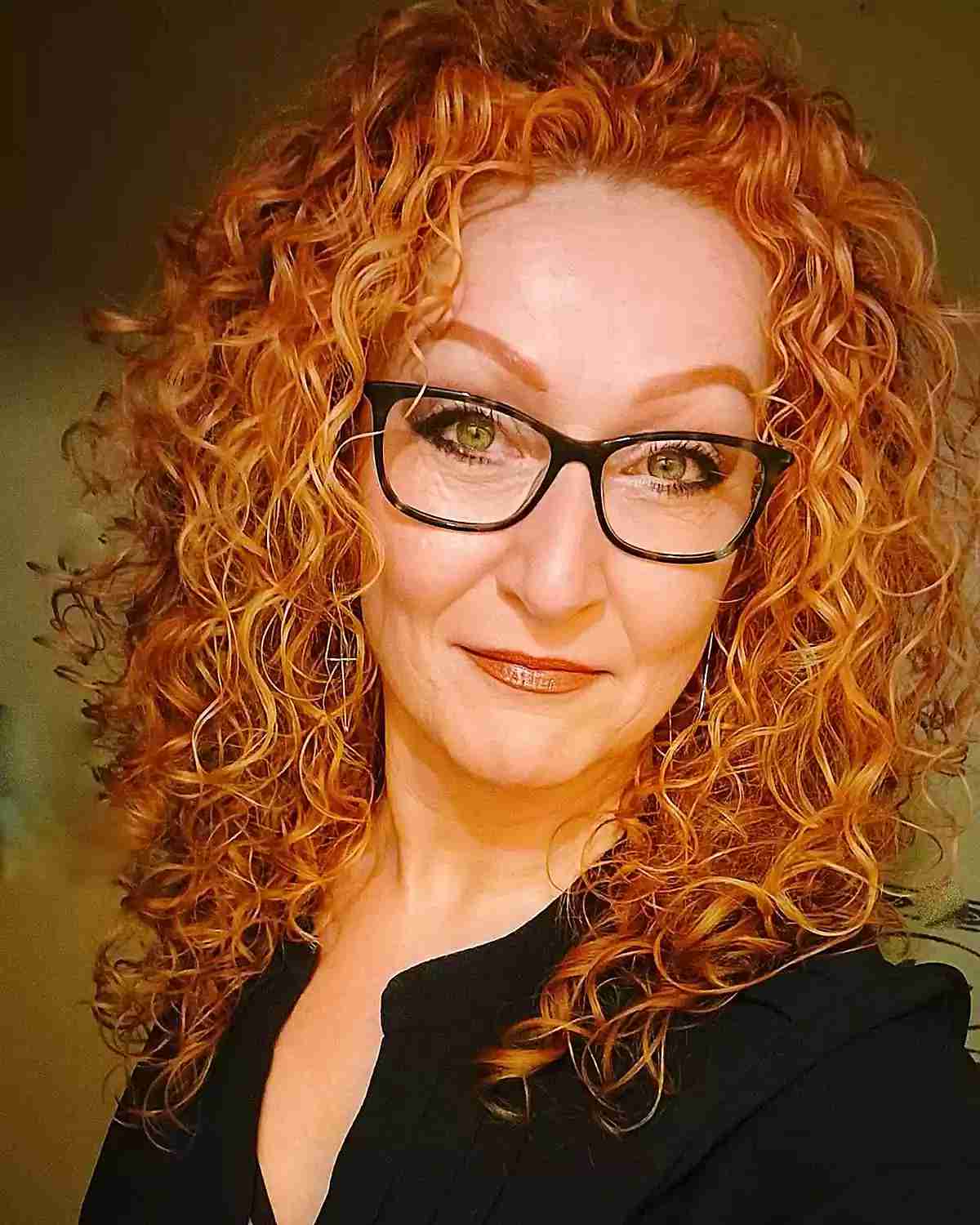 Medium-Length Layered Cut with Defined Curls on Women Aged 50 with Specs