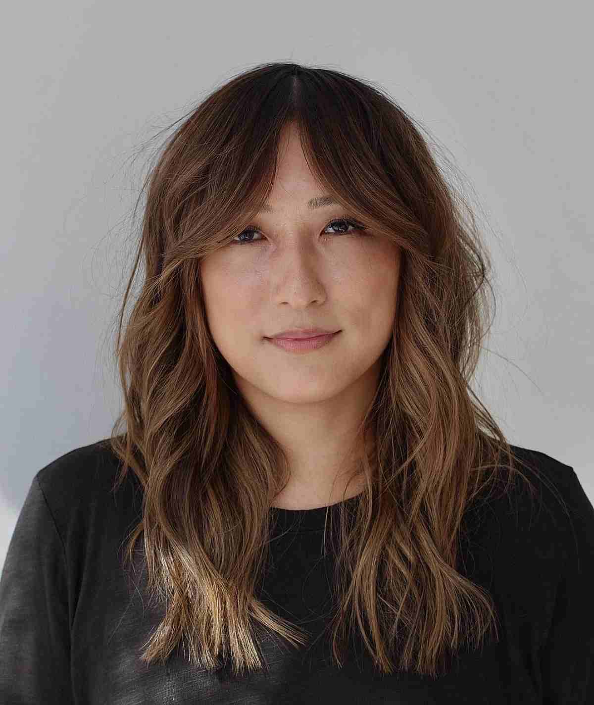 Fabulous Medium-Length Layered Waves With Curtain Bangs for Round Faces