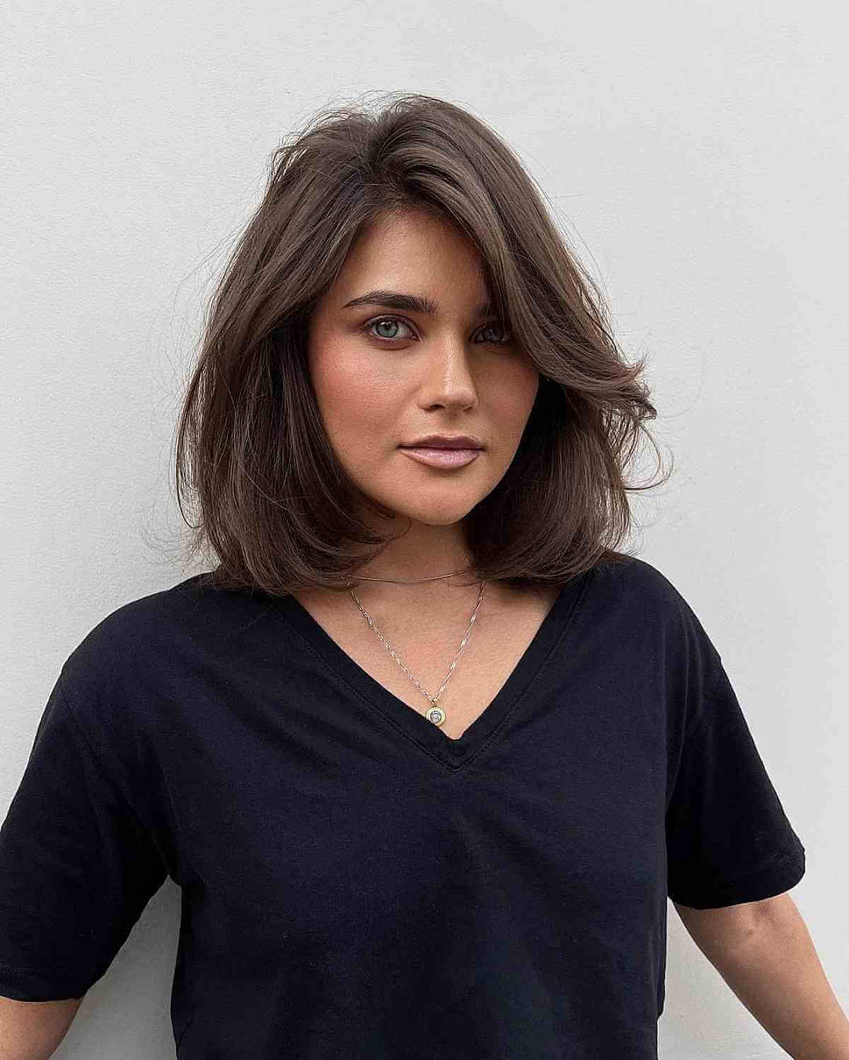 Medium-Length Natural Brunette Soft Layers and Side Bangs