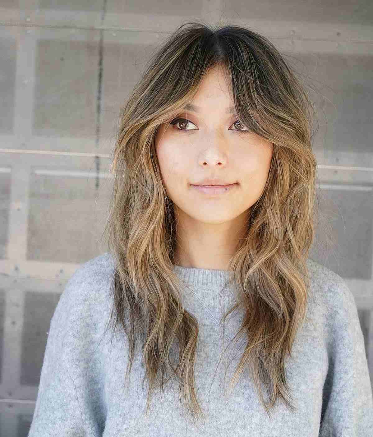 Adorable Medium-Length Razored Layers with Beach Waves