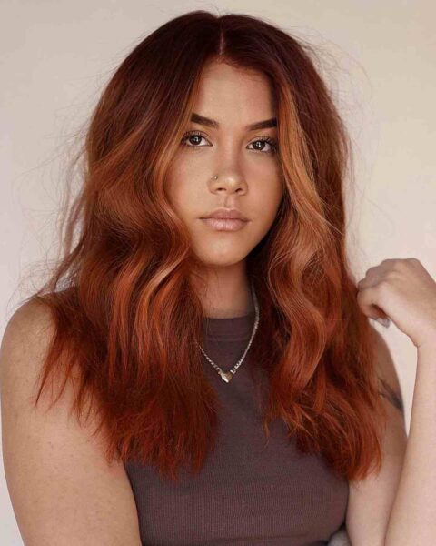 A Medium-Length Shag with Red Balayage