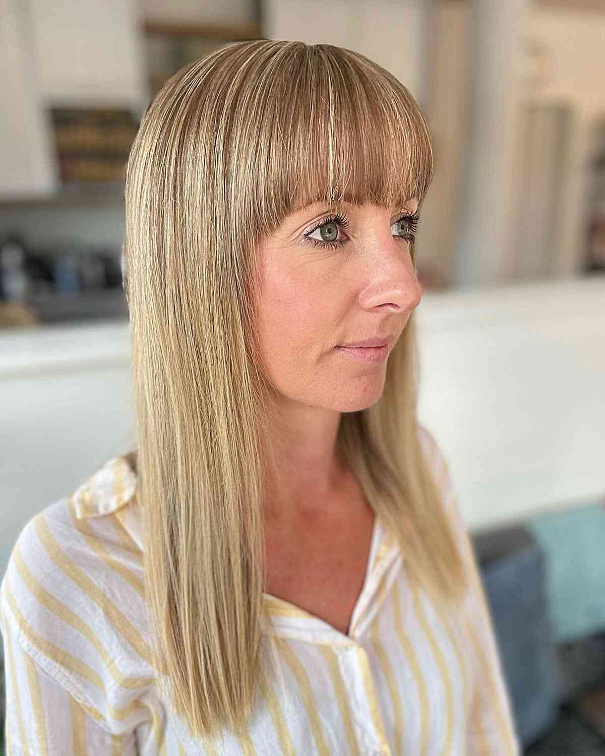 Medium-Length Straight Hair with Natural Blonde Tones