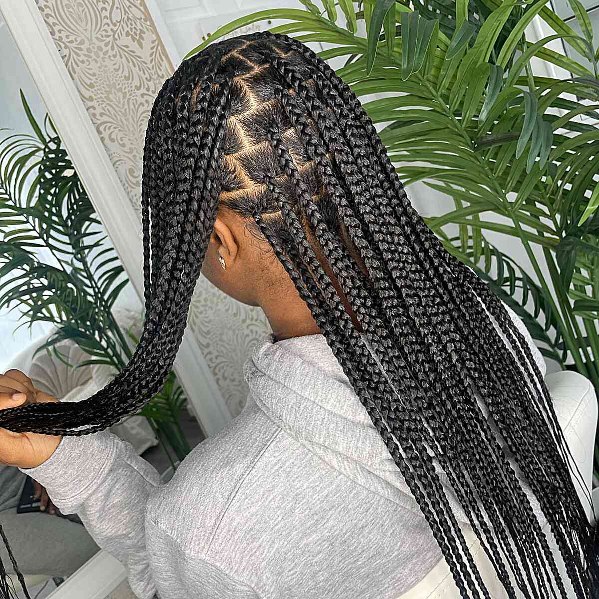 Long and Black Medium-Sized Knotless Braids with Sleek Baby Hairs
