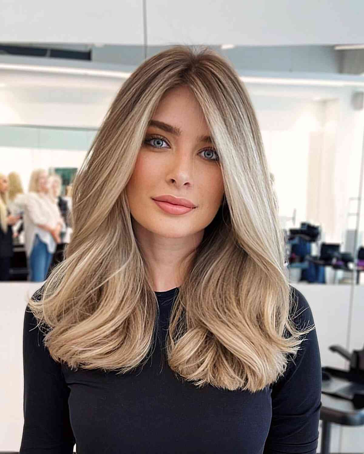 Medium Subtle Middle-Part Thick Haircut for women with blunt ends and no bangs