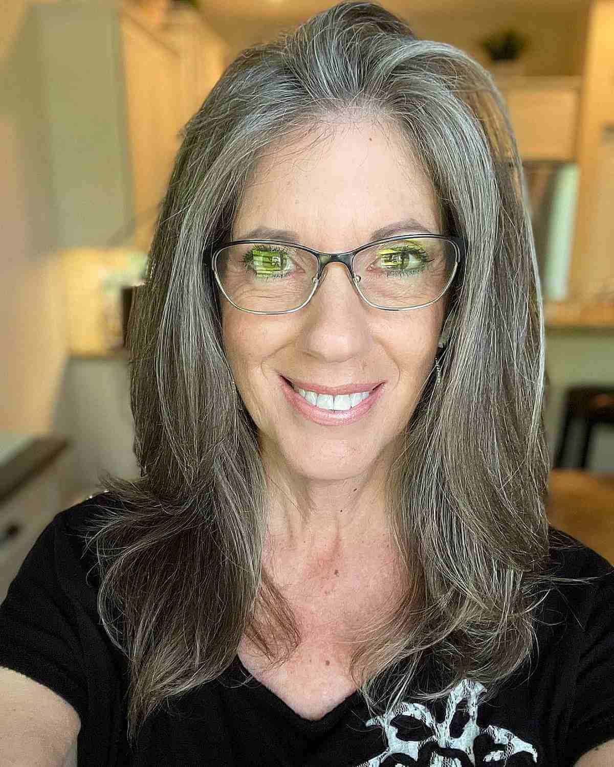 Medium to Long Layered Cut on Grey-Haired Women Over Fifty