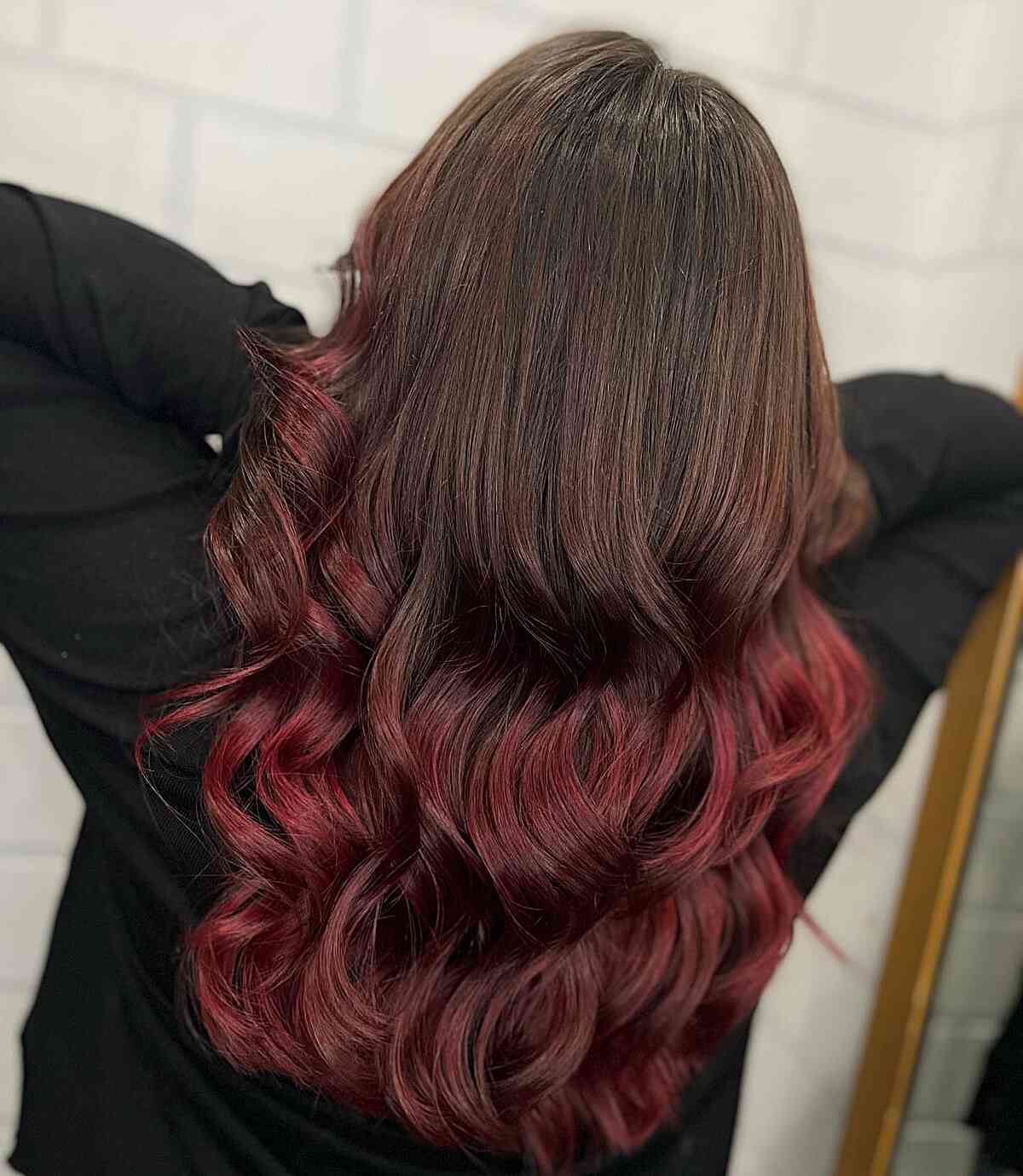 Melted Brown to Burgundy Red Balayage Hues for Long Layered Hair