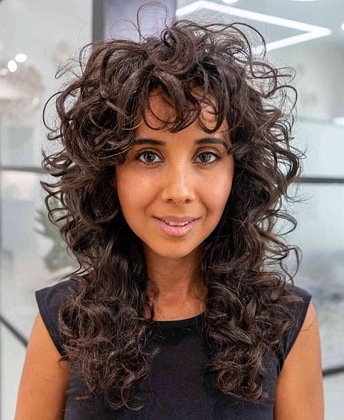 Messy and Lived-In Curly Shag for ladies with long hair