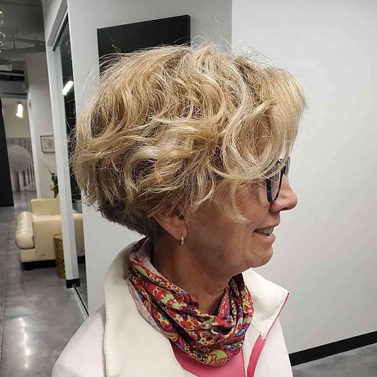 Messy Bob Cut for Wavy Hair for Women Over 60 with glasses
