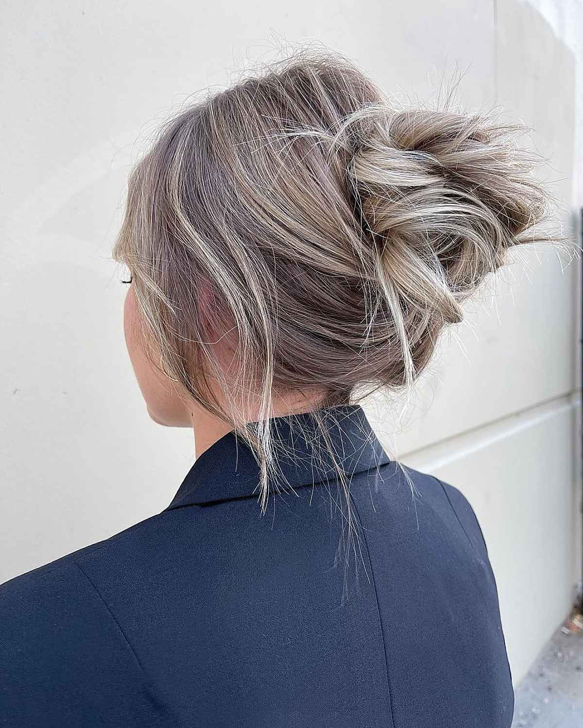 Messy Bun with Wispy Ends