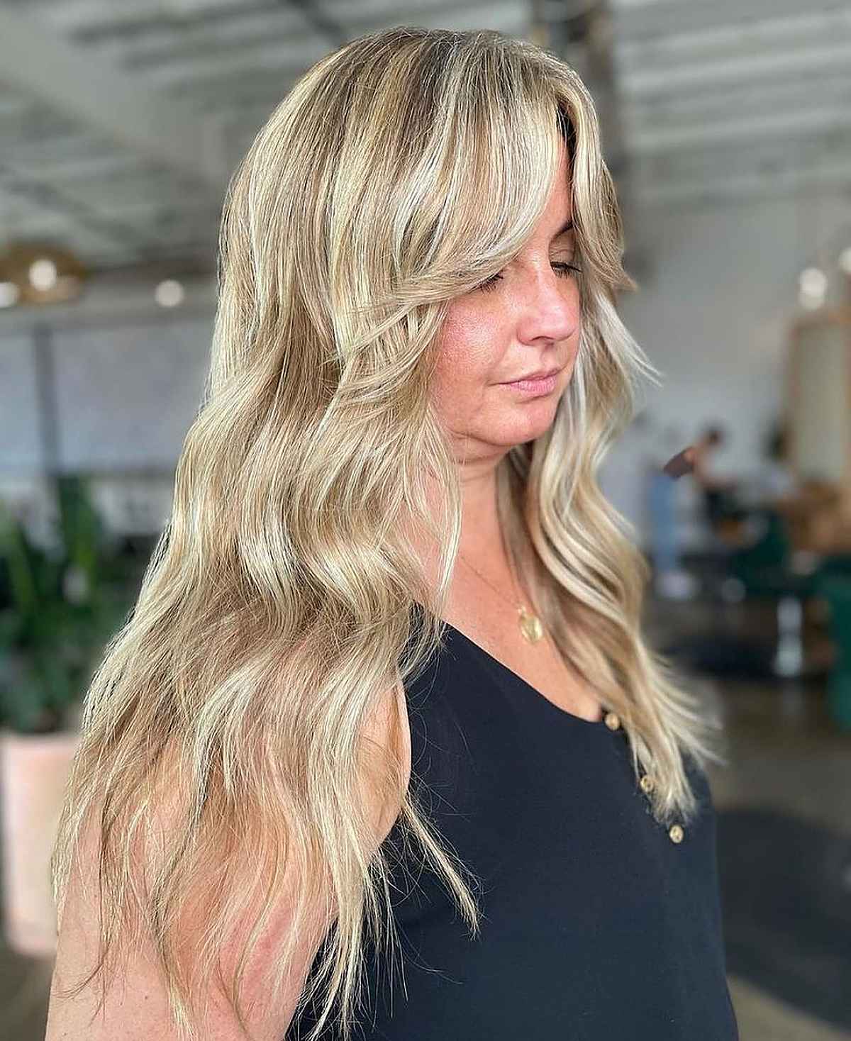 messy french vanilla long blonde with layers