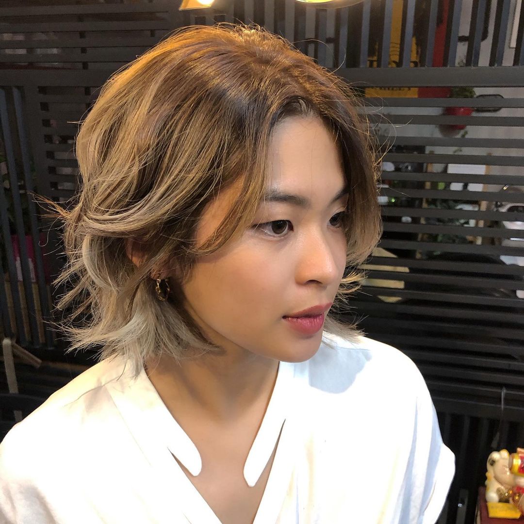 Messy layered bob with a middle part