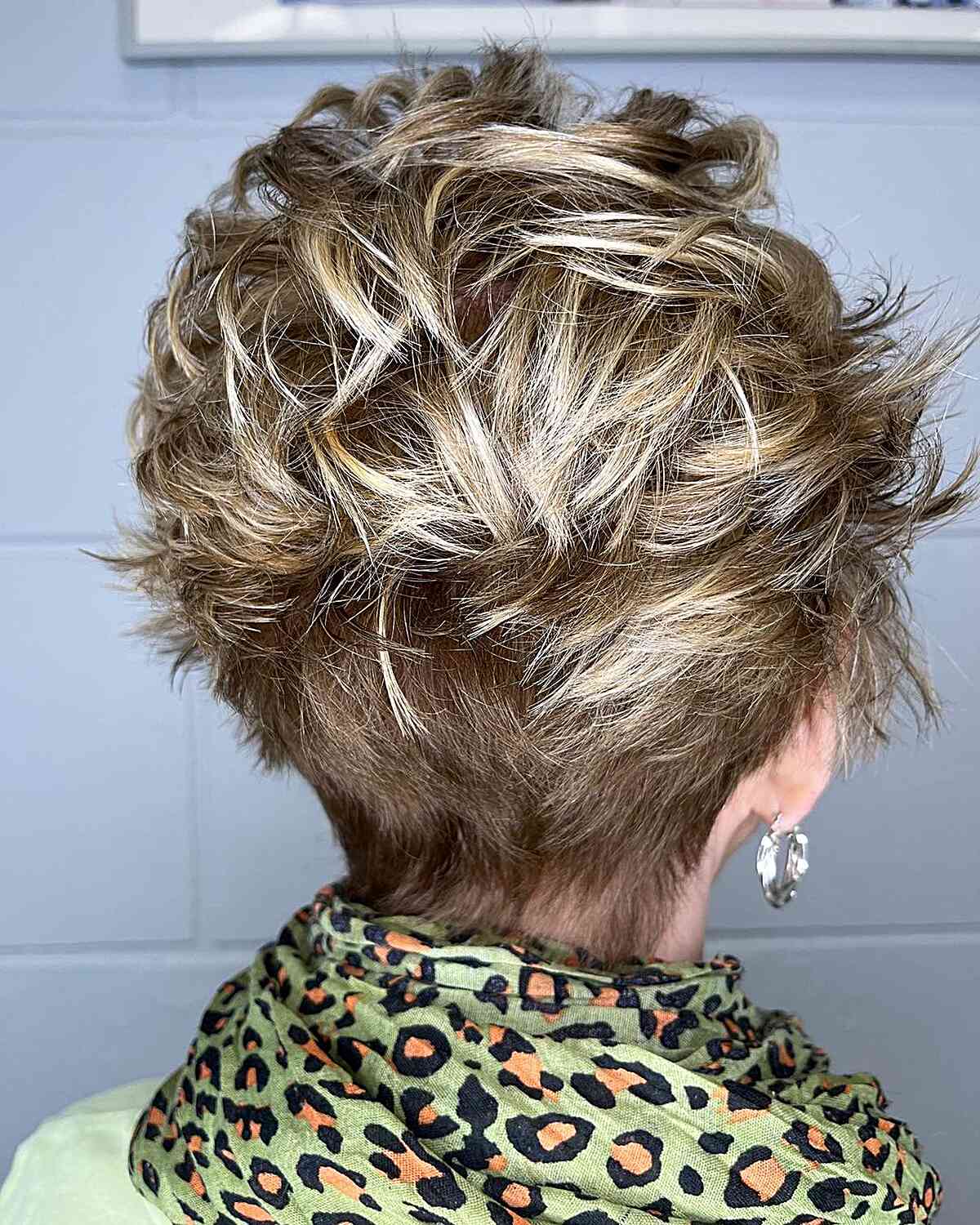Short-Length Messy Pixie with Feathery Layers for Seniors Aged Sixty