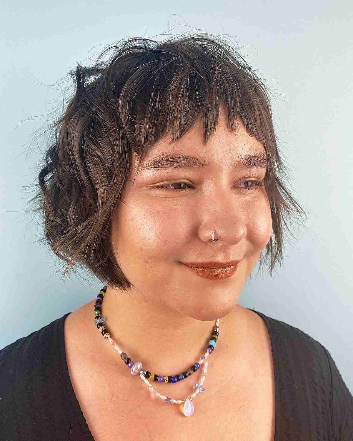 Messy Textured Bob with Piece-y Bangs for Chubby Faces