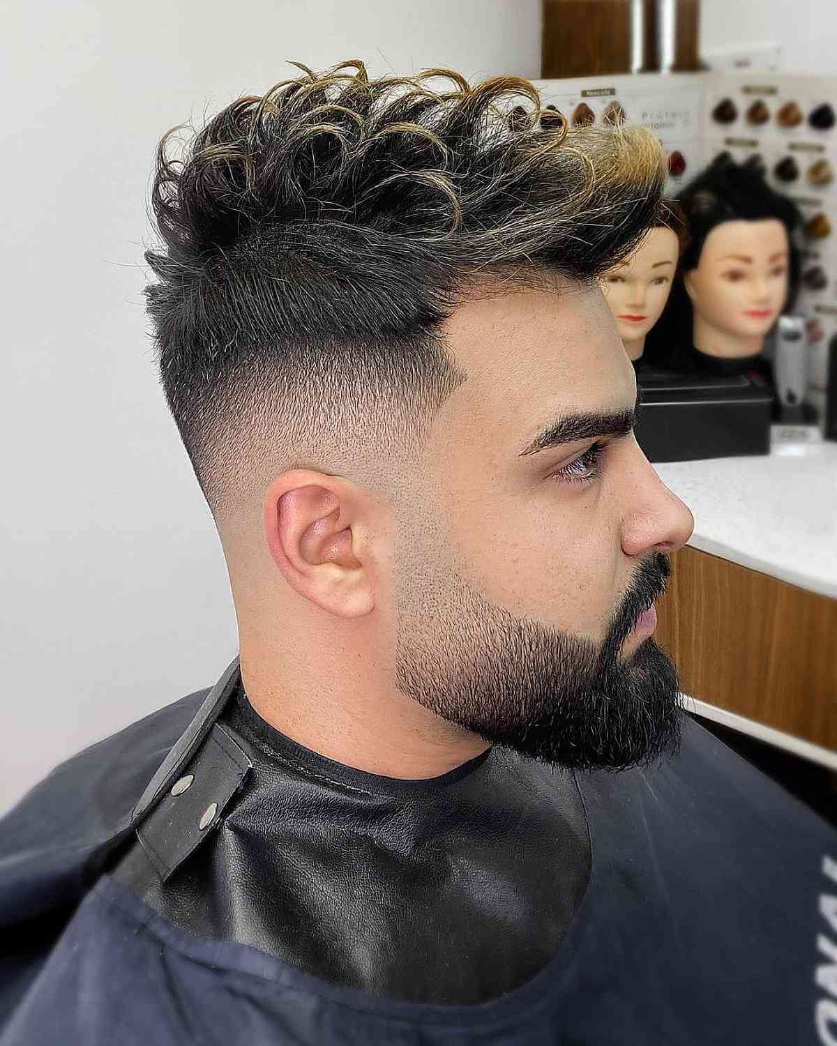 Messy Top with Highlights and a Beard Fade