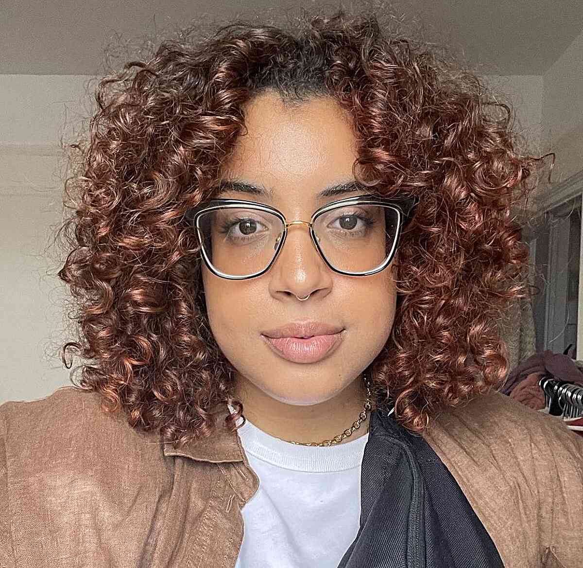 Mid-Length Auburn Curly Balayage Hair