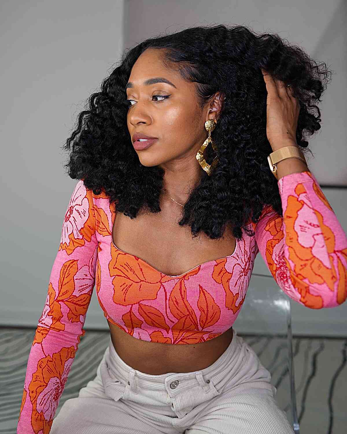 Mid-Length Black Twist out Curls with Swooped Edges