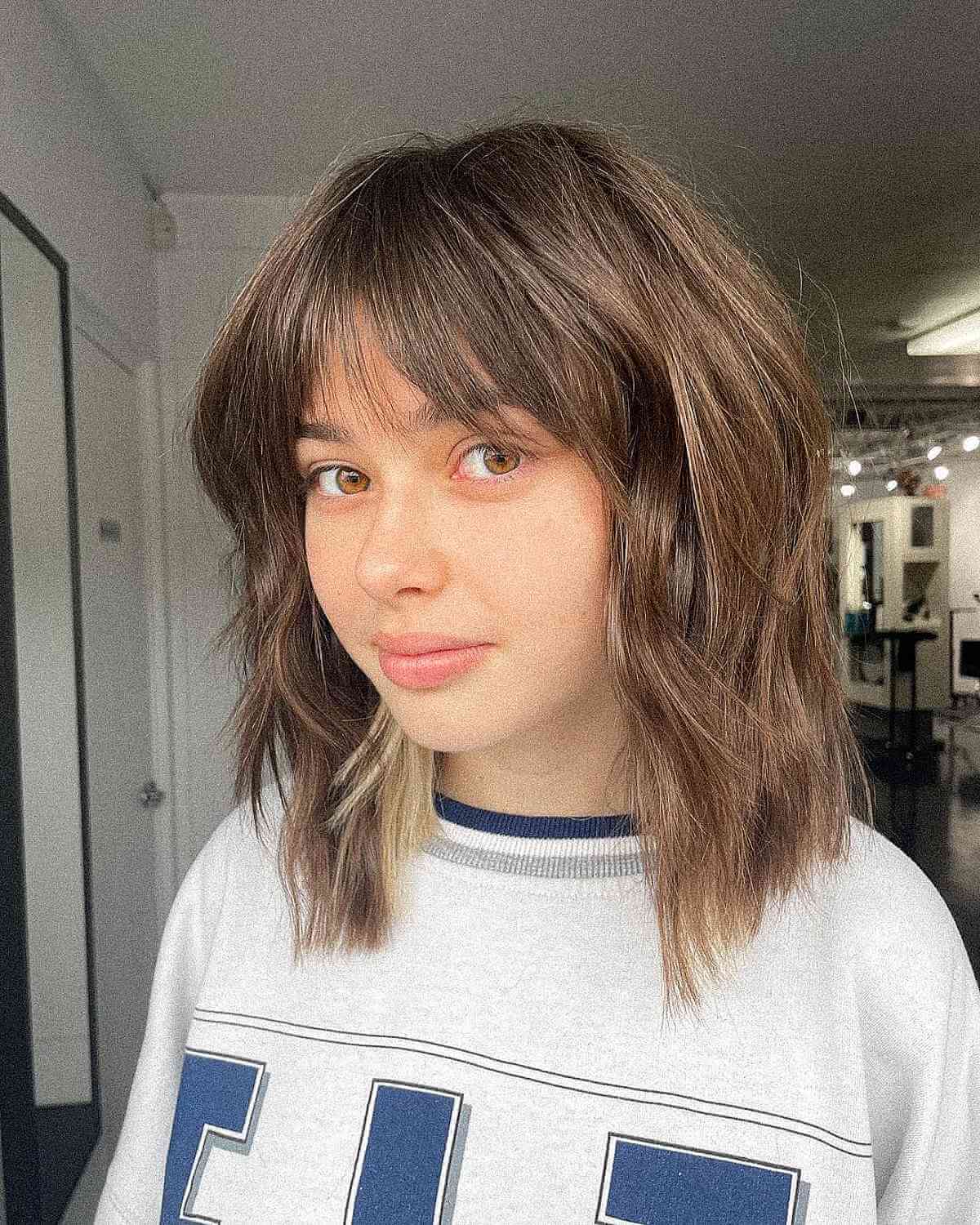 Trendsetting Mid-Length Bob with Bangs