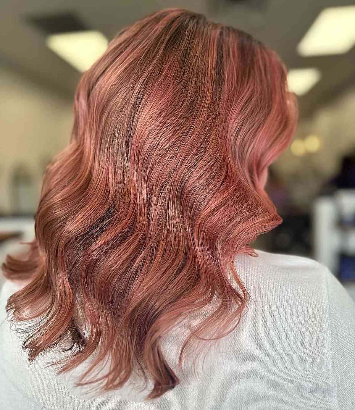 Mid-Length Brunette Hair with Rose Gold Balayage Highlights