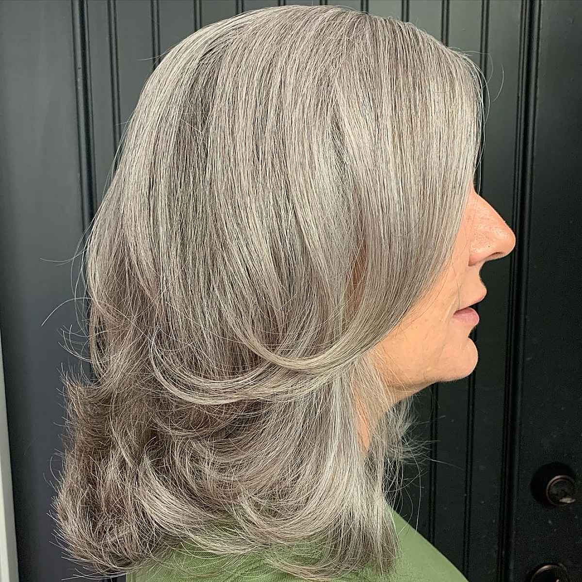 Mid-Length Cut with Feathered Layers for women past 60