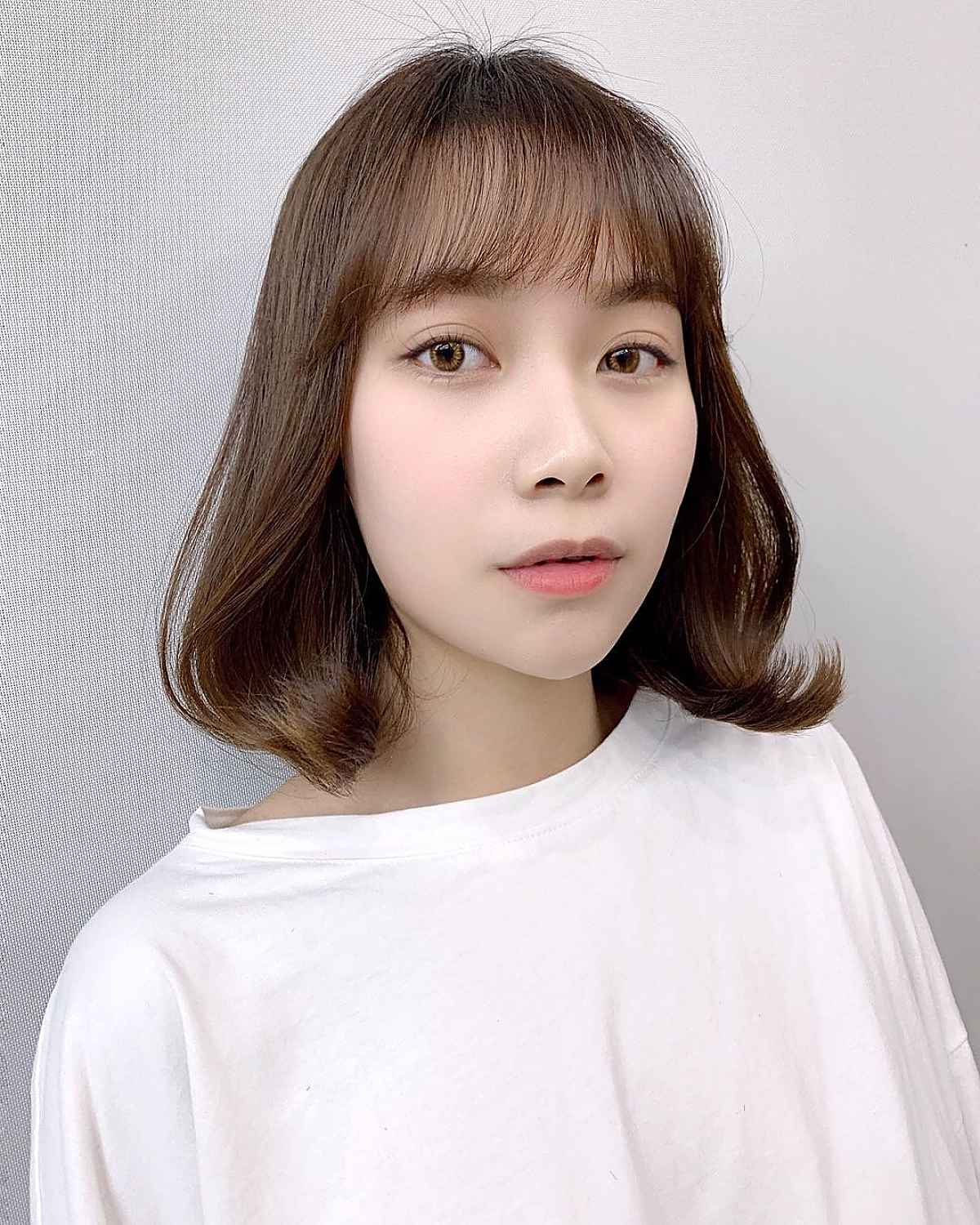 Mid-Length Cut with See-Through Bangs