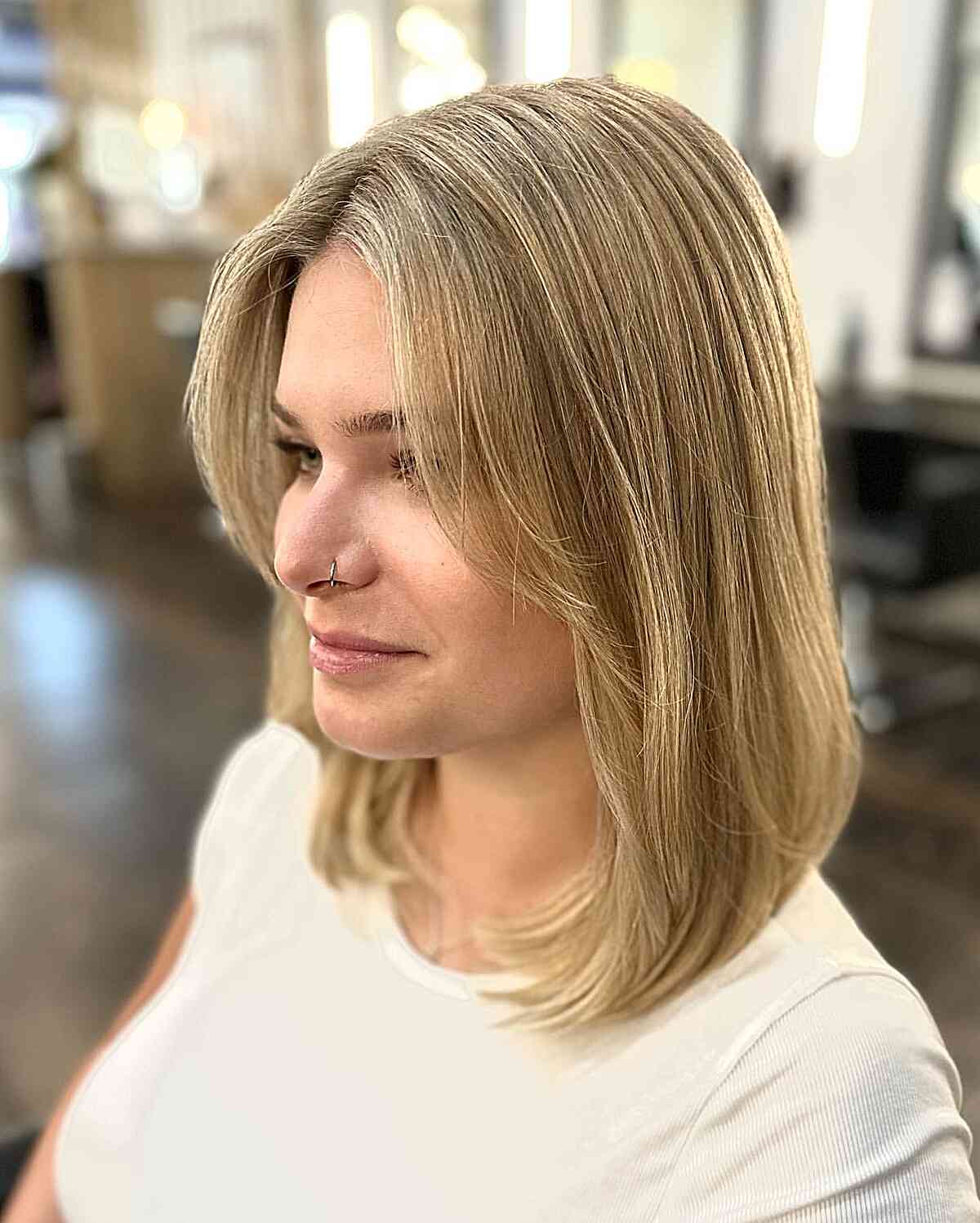 Mid-Length Bright Honey Blonde Lob with Balayage and Face-Framing Bangs and Middle Part