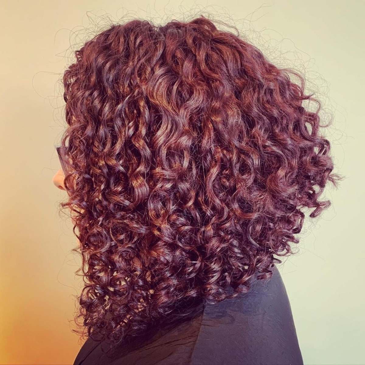 Mid-length inverted bob for curly locks