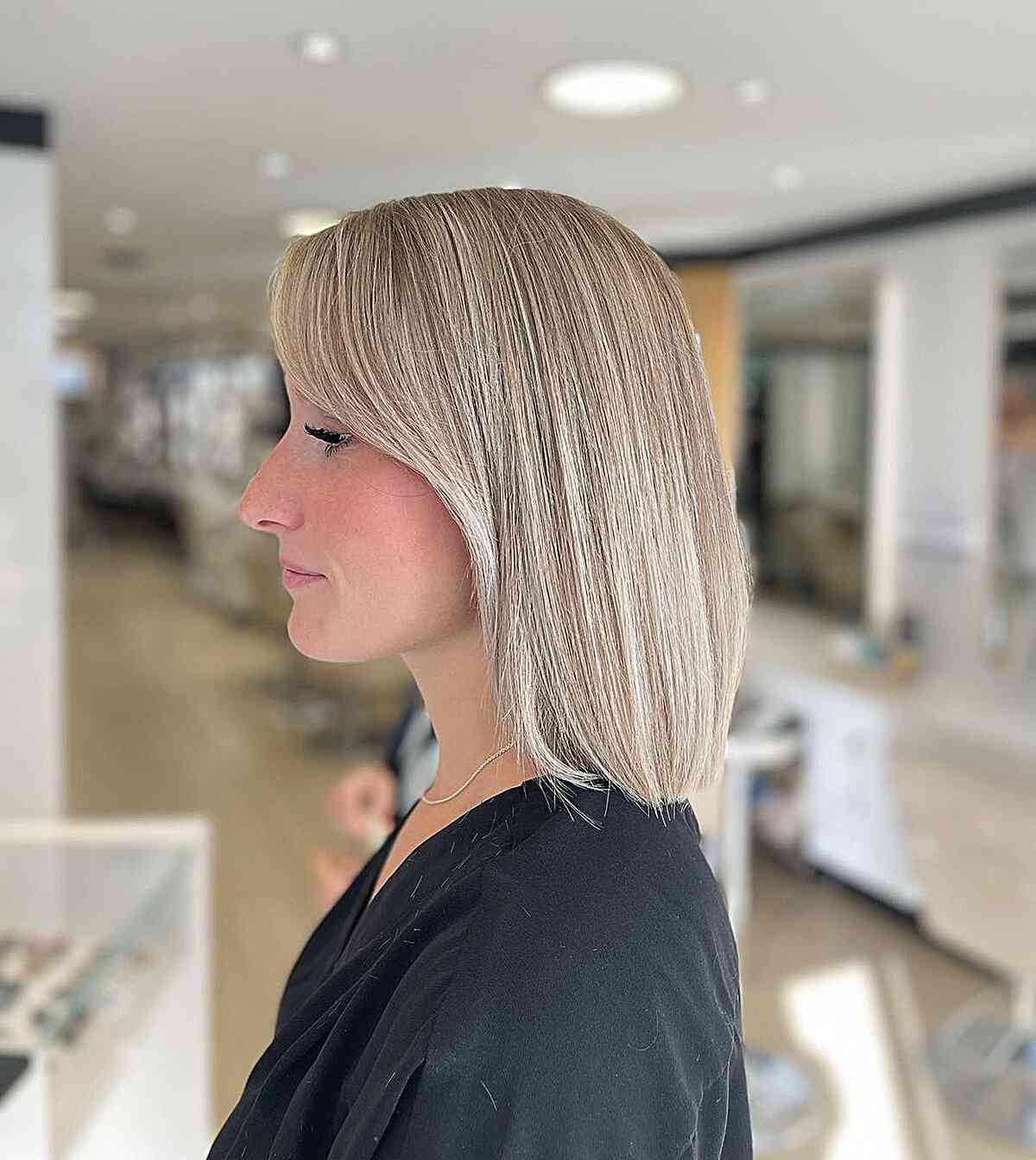 Mid-Length Lob with Side-Swept Bangs